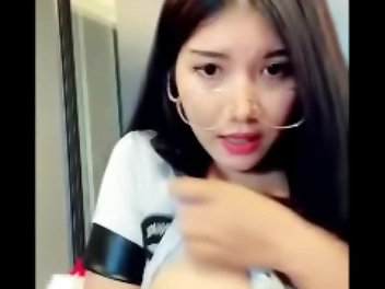 Gorgeous JAV Enchantress Titillates with Her Alluring Looks and Slutty Behavior