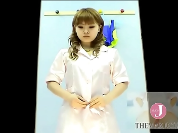 Experience the Alluring Japanese Model Tamago as She Changes Clothes in Voyeuristic Scene